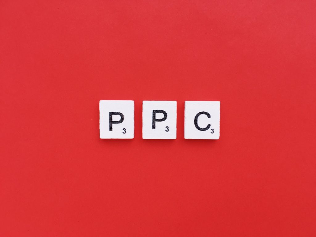 PPC scrabble letters word on a red background